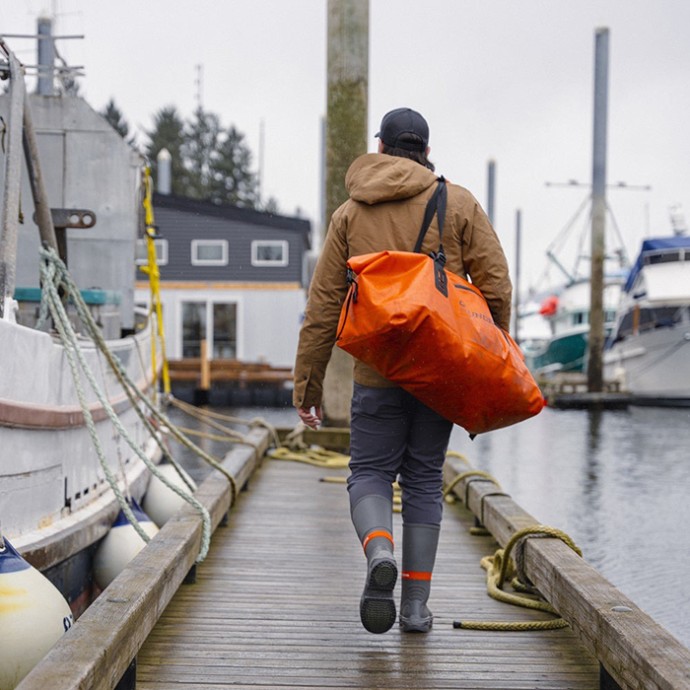 Vodootporna torba Grundéns Shackleton Duffel 105L - Red Orange Vel. O/S